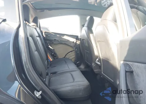 2025 Tesla Model Y Long Range Dual Motor Rear-Wheel Drive z USA, uszkodzony, nr VIN 7SAYGDED0SA348838